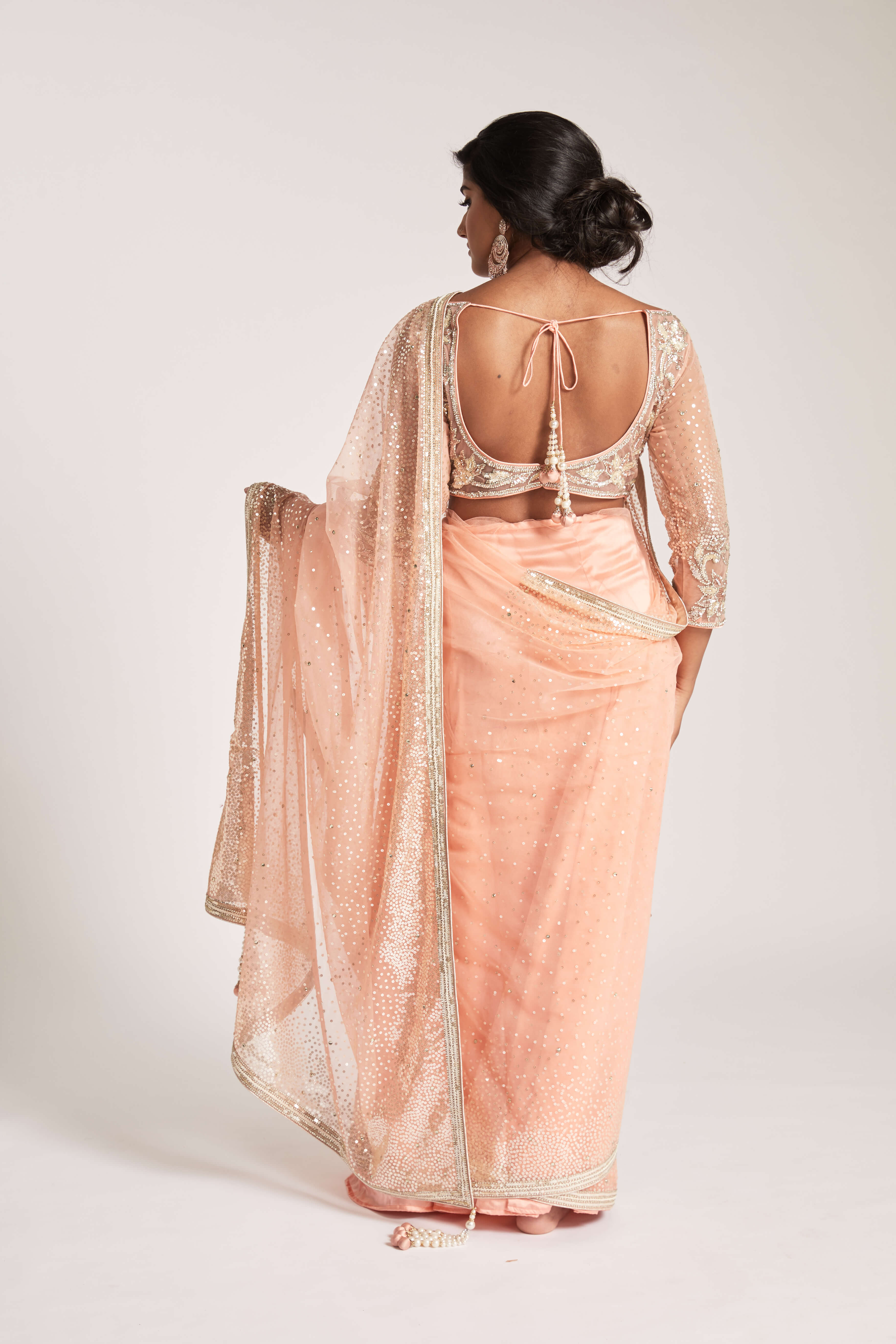 Net Silver Zari Embroidered Saree in Peach - KARMAPLACE.COM